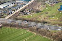 Luchtfoto uit zaterdag 19 maart 2011 met de rijksweg A12 met midden onder het Fectio Vechten terrein. Links Het Blauwe Huisviaduct over de Staatslijn H tezamen de Nieuwe Houtenseweg. Bron: RWS, beeldbank.