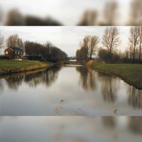 Het Inundatiekanaal met in het midden de dam die toegang geeft tot Lunet De Snel en links het woonhuis langs de Gedekte Gemeenschapsweg in december naar een foto van O.J. Wttewaall. Bron: Regionaal Archief Zuid-Utrecht (RAZU), 353.