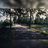 De Lange Uitweg met de brug over het inundatiekanaal in Tull en 't Waal in de periode 19801990. Bron: Regionaal Archief Zuid-Utrecht (RAZU), 353.