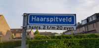 Straatnaambord Haarspitveld op vrijdag 8 mei 2020. Foto: Sander van Scherpenzeel.