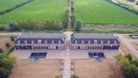 Luchtfoto van de nieuwe oranjerie/koetshuizen behorend bij het kasteel Heemstede richting het noordoosten gezien op maandag 15 juni 2020 (2). Foto: Bert Goes.