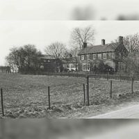 Gezicht vanaf de Beusichemseweg op de woning behorende bij de voormalige landbouwschool met daarachter de school in 1979 naar een foto van Jos Schalkwijk. Bron: Regionaal Archief Zuid-Utrecht (RAZU), 353.
