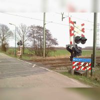 De oude spoorwegovergang in de Staatslijn H in 2009 tussen de Fortweg en Mereveldseweg. Foto: Sander van Scherpenzeel.