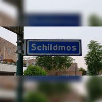 Straatnaambord 'Schildmos' in de zomer van 2021. Foto: Sander van Scherpenzeel.