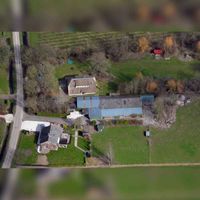 Luchtfoto van boerderij 't Haagje te Maurik aan de Hornixveldweg nr. 8 in 2016. Foto: Slagboom en Peeters Luchtfotografie B.V..