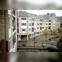 Zicht vanaf het balkon vanaf de tweede verdieping van een appartement aan Het Rond in 1988-1995. Met midden links het begin van het Schonenburgseind. Foto: Cees van Liempt. Bron: RAZU, 353.